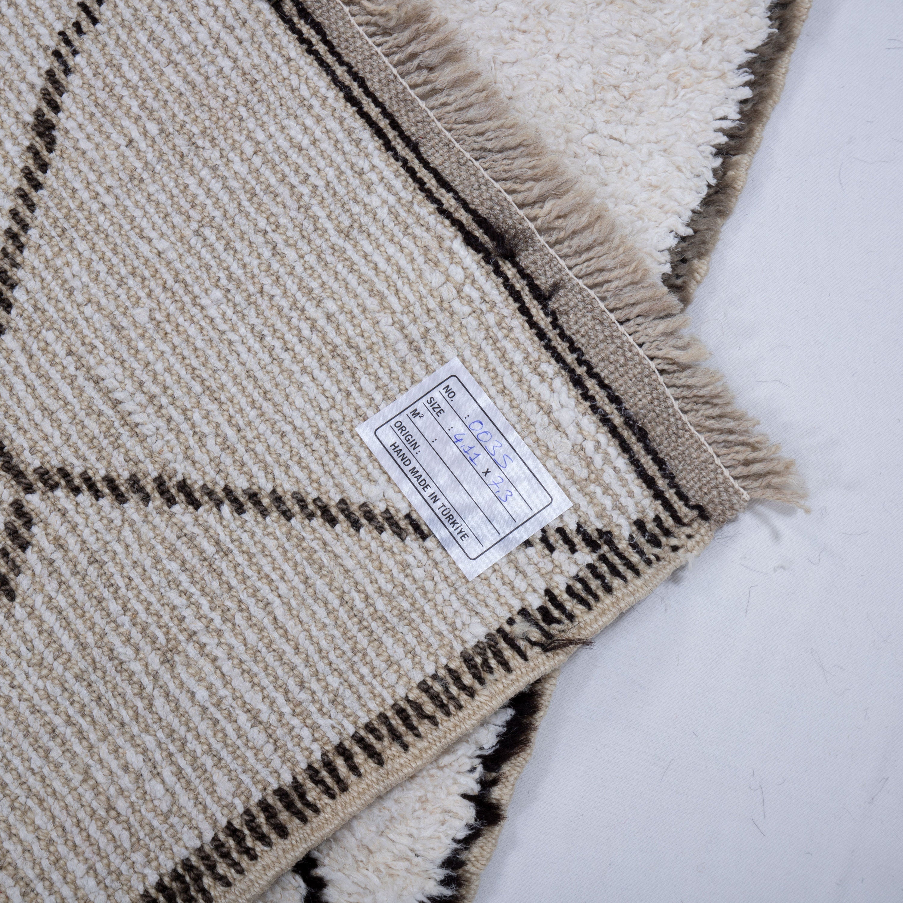 Contemporary TURKISH RUG up cycled from vintage HEMP and goat hair flat weaves.